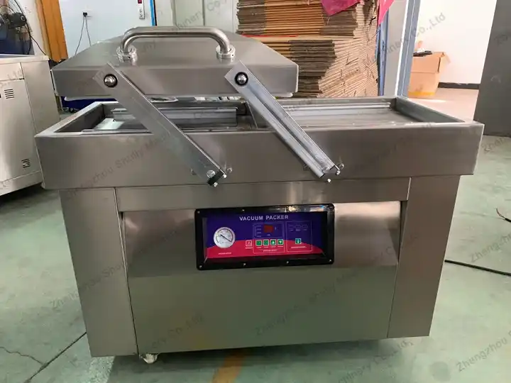 Vakuumverpackungsmaschine für Knoblauchzehen 12 Doppelkammer-Vakuumverpackungsmaschine für Knoblauchzehen